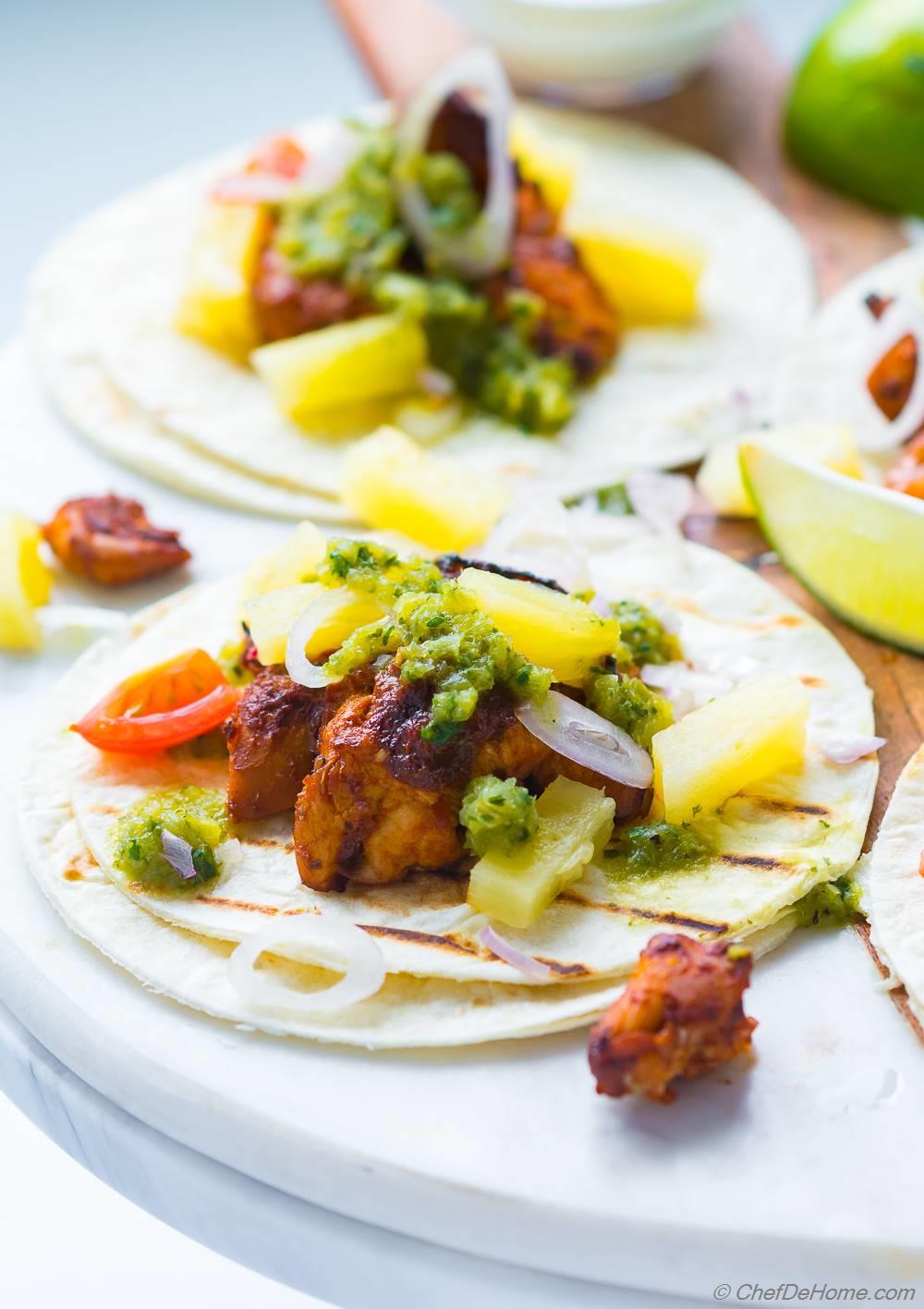 Tacos Al Pastor with pineapple and salsa verde