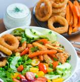 Tofu and Sweet Potato Fries Shawarma Salad Bowl with Onion Ring Croutons