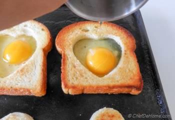 Step for Recipe - Sunny Side up Egg-Heart Toasts For Valentine's Day Breakfast