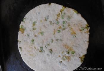 Step for Recipe - Spiced Potatoes and Peas Stuffed Flat Bread with Preserved Lemons