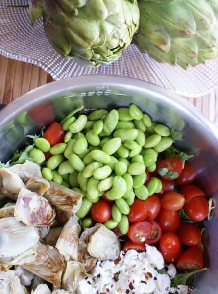 Cherry Tomatoes, Artichoke, Edamame Salad with Goat Cheese, Cilantro-Lime Vinaigrette