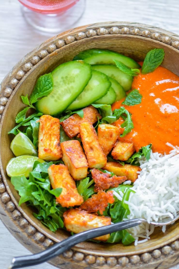 Crispy Garlic Tofu Rice Bowl with Romesco Sauce