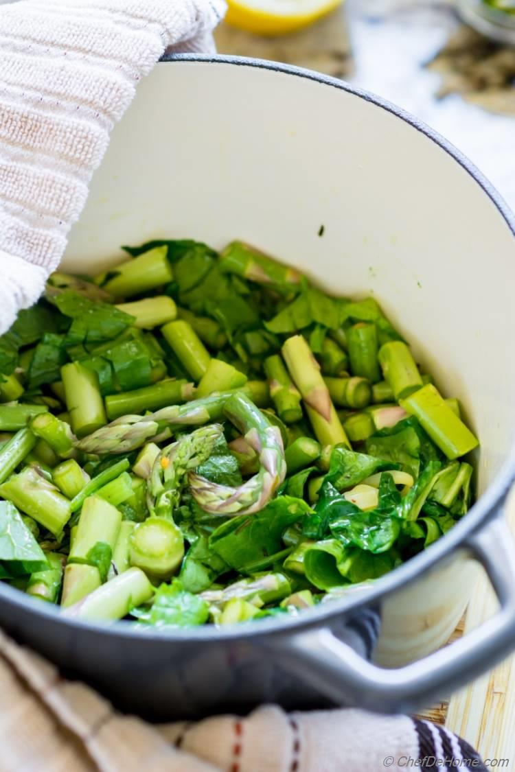 Ingredients for Creamy vegan Asparagus Soup in a pot