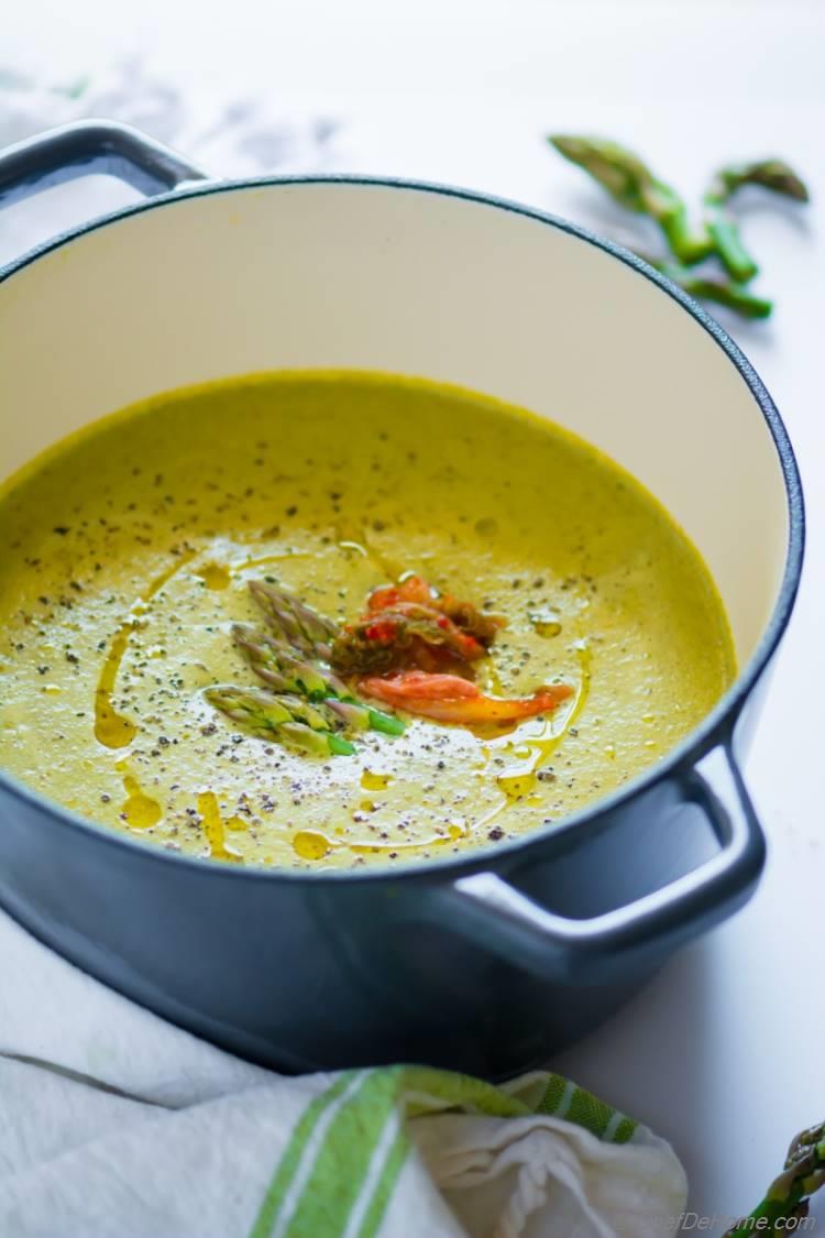 Creamy cream of asparagus soup without cream with spicy ginger and chili and coconut milk