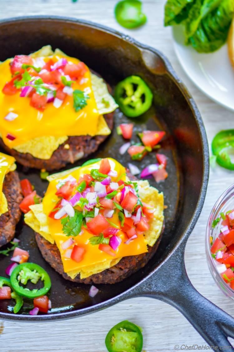 Veggie Black Bean Burger Patties topped with Mexican Nacho Cheese for a crunchy surprise | chefdehome.com
