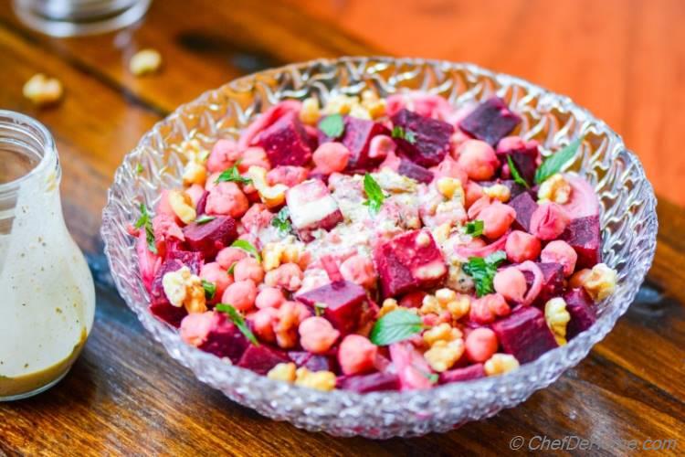 Sweet Beets and Chickpeas Salad with a creamy yet vegan tahini dressing!