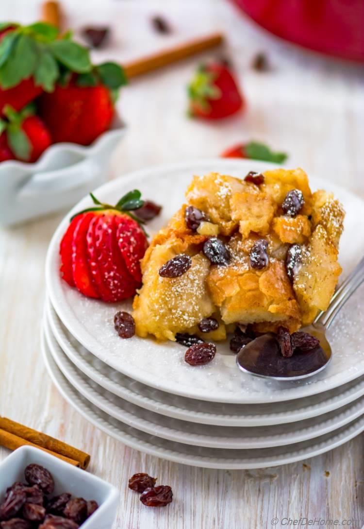 Moist and perfectly made bread pudding with strawberries cinnamon and raisins | chefdehome.com