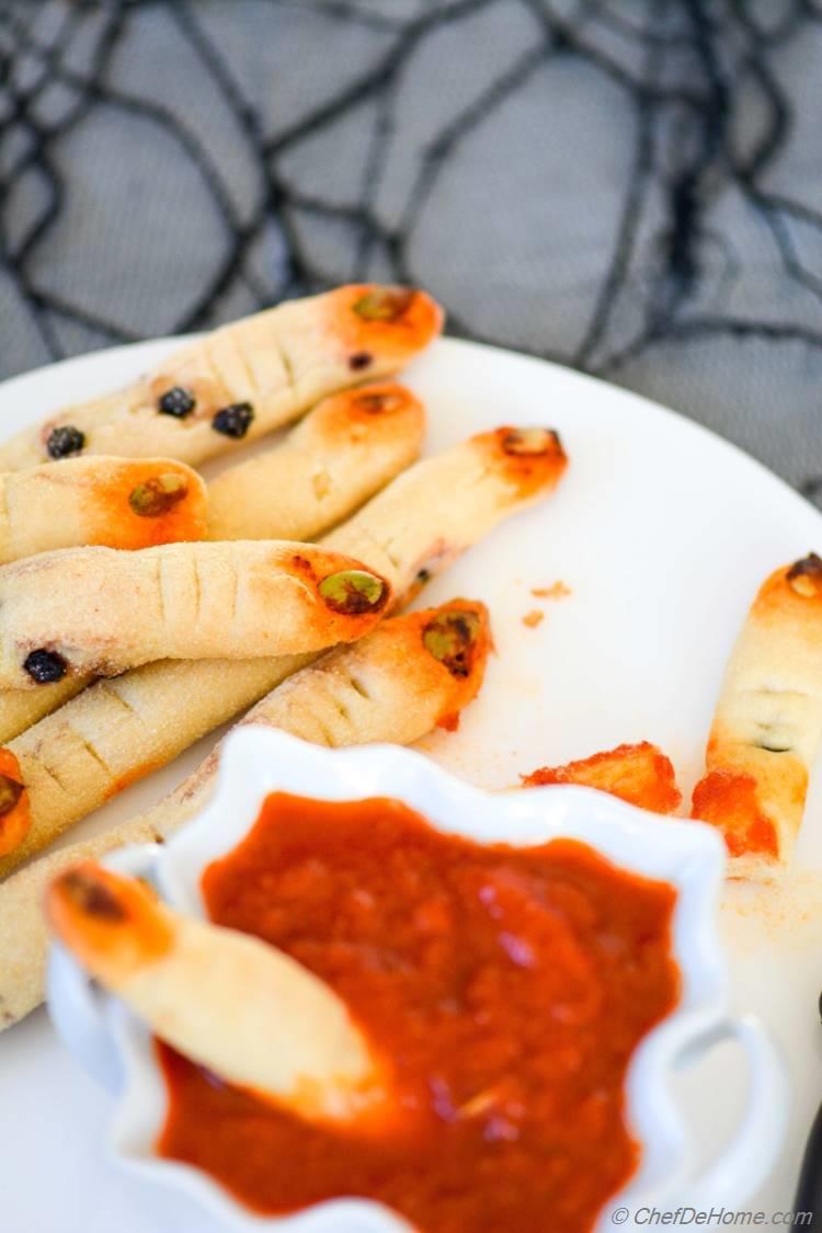 Creepy Witch Fingers stained in blood, mold and dipped in blood! Great and fun idea for a #halloween #snack!