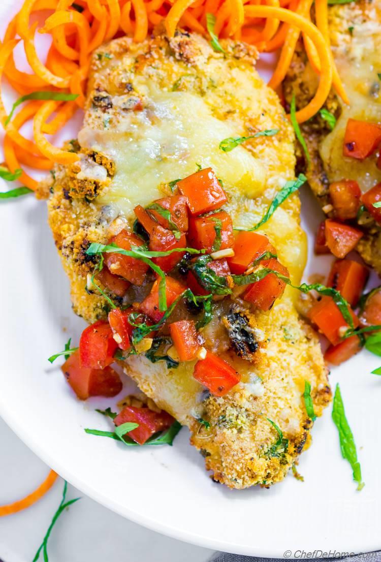 Baked bruschetta chicken recipe for dinner with lite almond crust topped tomato balsamic bruschetta