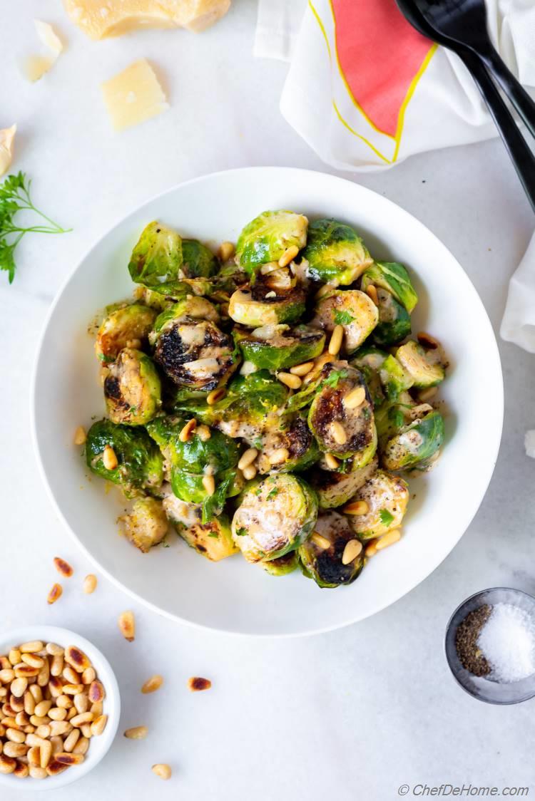 Parmesan Brussel Sprouts with Creamy Garlic Sauce and Toasted Pine Nuts
