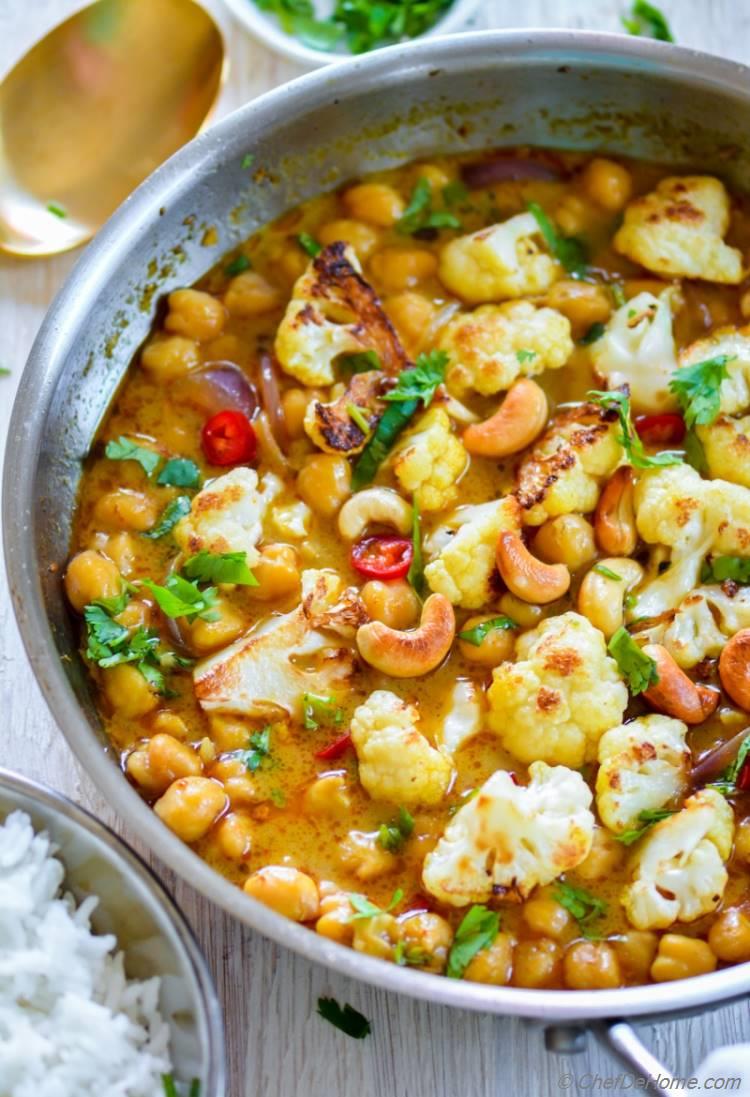 Chickpeas and Cauliflower Curry simmered in vegan coconut curry broth | chefdehome.com