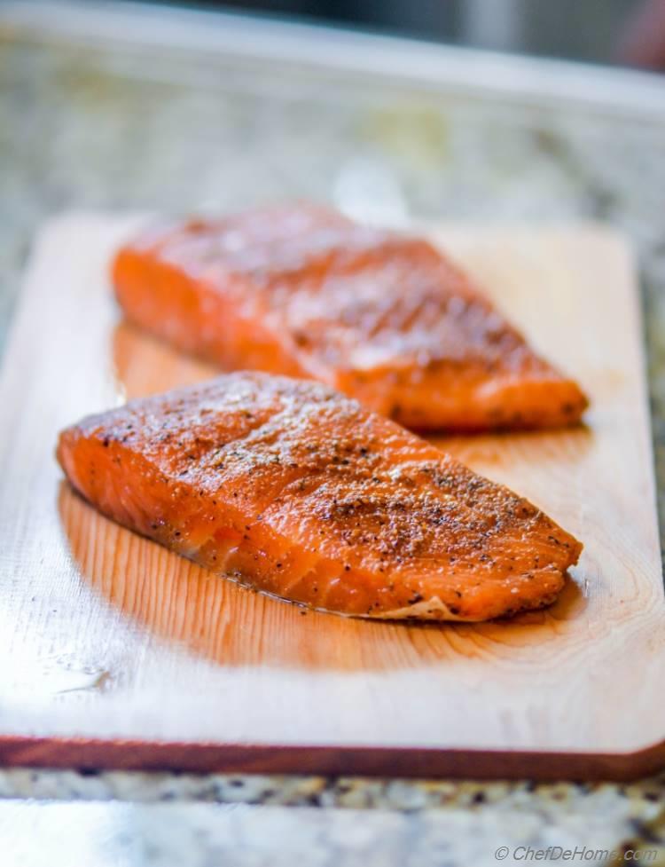 Dry Rubbed Salmon on a Cedar Plank ready to be grilled for a flavorful cedar aroma | chefdehome.com