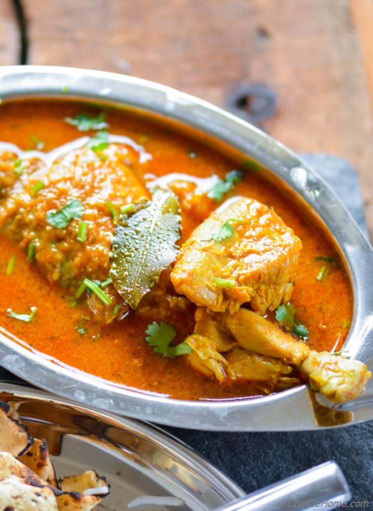 Indian Coconut Curry Chicken dinner with homemade garlic naan bread and rice | chefdehome.com