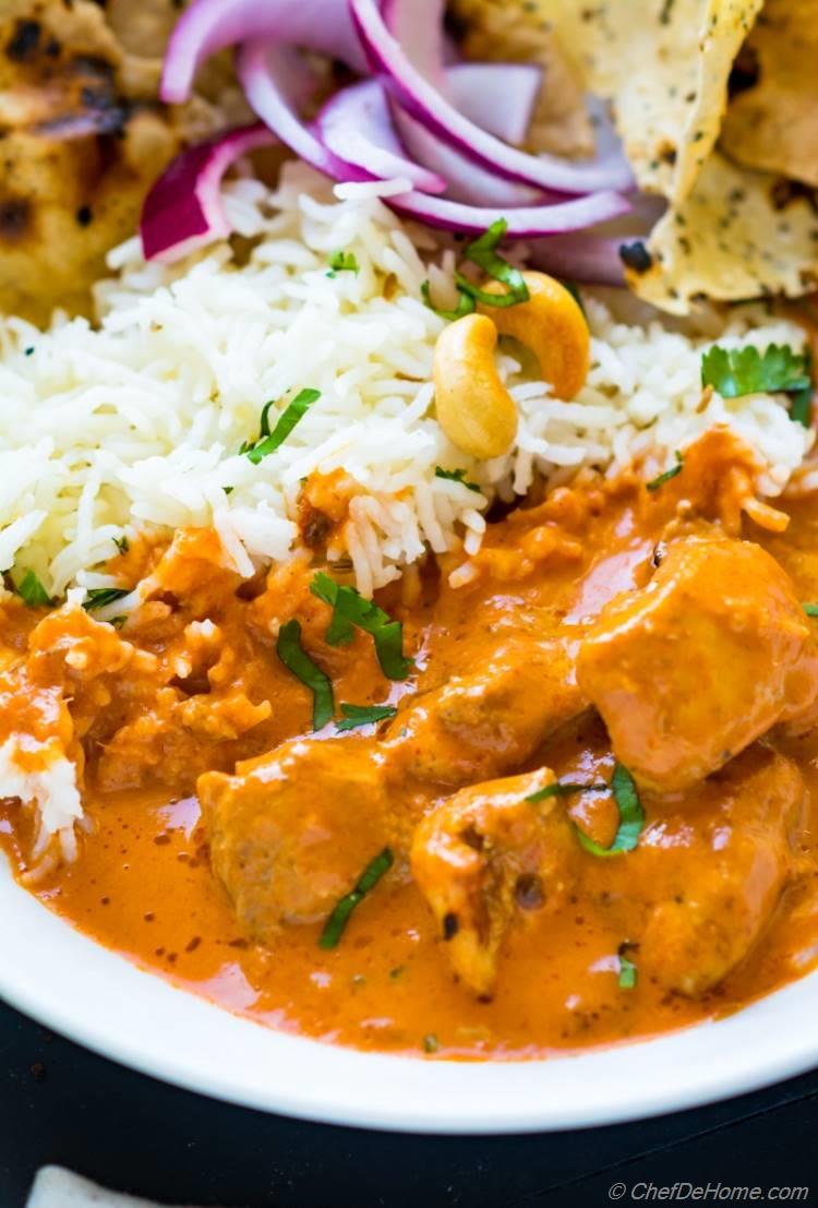 Creamy sauce of Tikka Masala with rice and pickle | chefdehome.com