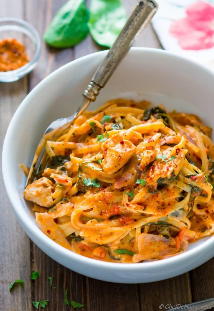 Spicy Cajon Chicken Pasta in abowl with spoon