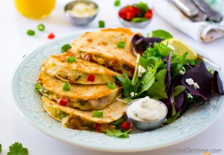 Chicken Quesadillas Loaded with spicy smoked grilled chicken and caramelized onions