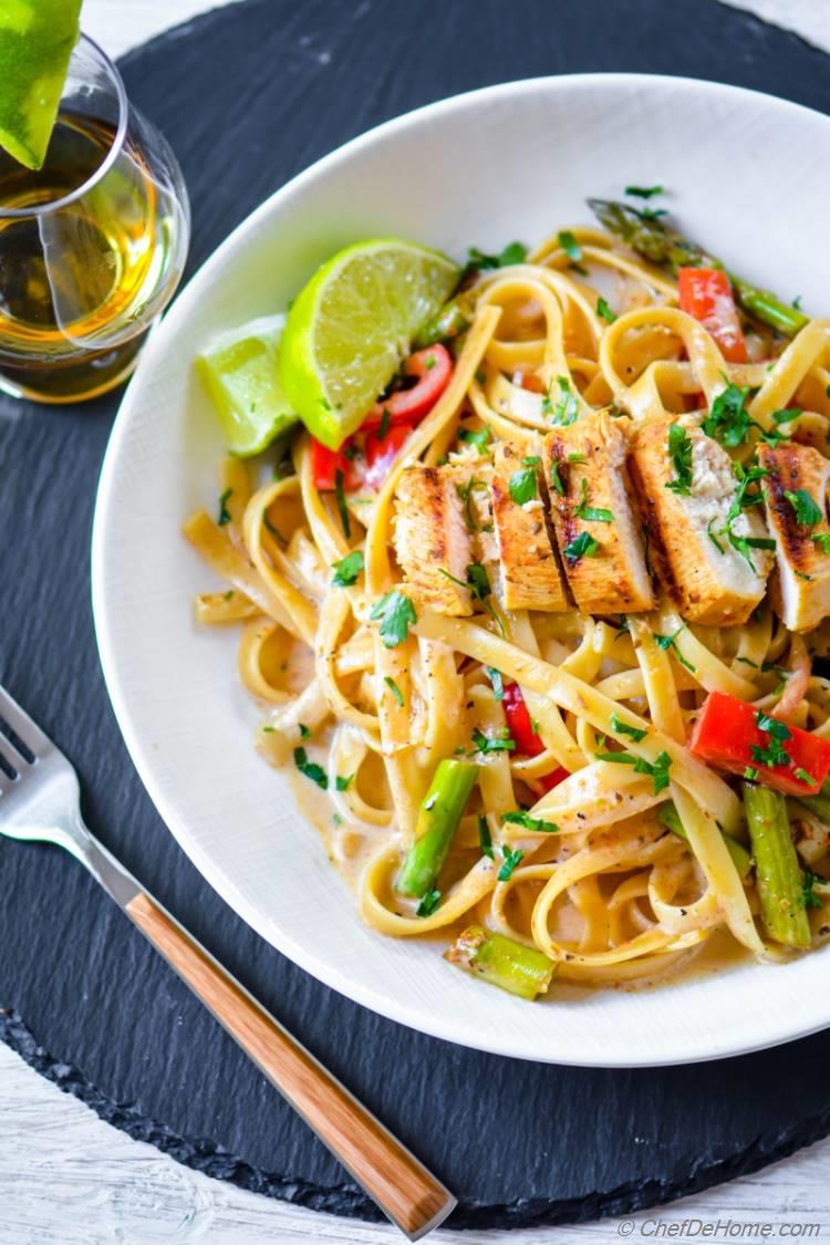 CPK copycat Chicken Tequila Fettuccine with tangy lime cream sauce pasta served with crunchy veggies and juicy chicken
