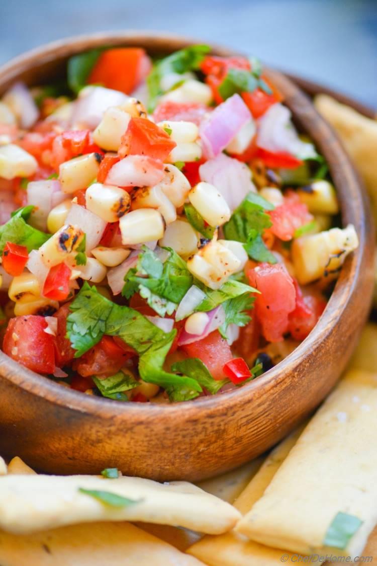 Tongue tantalizing Chili Lime and Roasted Corn Salsa, easy to assemble. No excuse for a great entertaining appetizer!