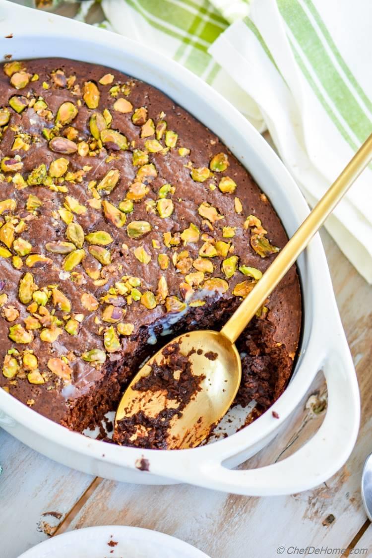 Gooey Chocolate Pudding Cake with hint of chili and topping of roasted light sweet and salty Pistachios | chefdehome.com