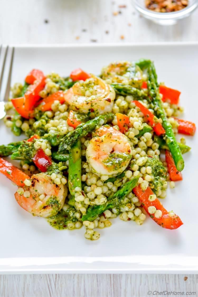 A lite dinner or delicious potluck salad loaded with lean grilled shrimp Chimichurri Sauce and nutty couscous pasta | chefdehome.com