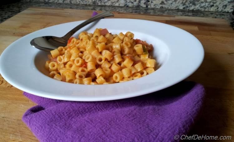 Ditalini pasta in tomato and onion wine sauce