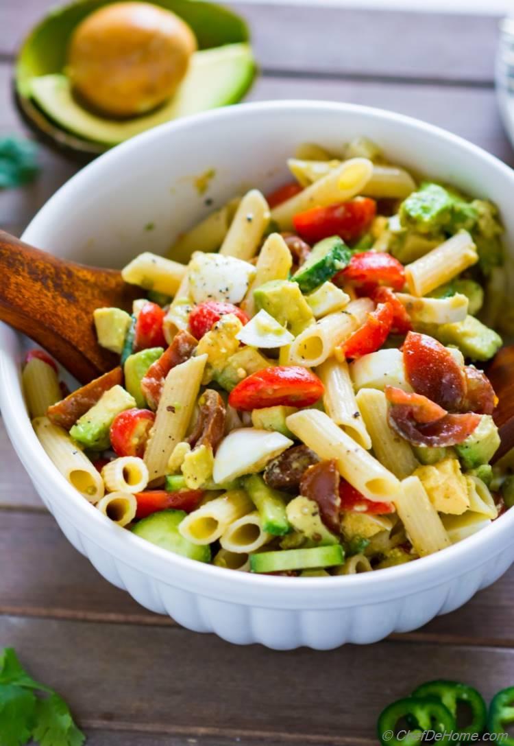 Deviled Egg Pasta Salad with healthy avocado tomato and cucumber