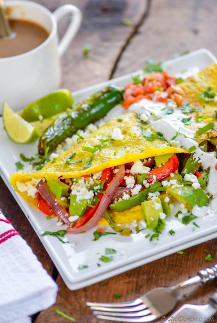 Chicken Breakfast Omelette with healthy fajita filling spicy salsa and avocado | chefdehome.com