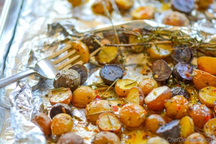 Herb Roasted Baby Rainbow Potatoes with Sweet and Spicy Mustard Dressing! An easy side dish with roasted or grilled meat dinner. Mix in some fresh tomatoes, onion, cilantro for Roasted Potato Salsa!