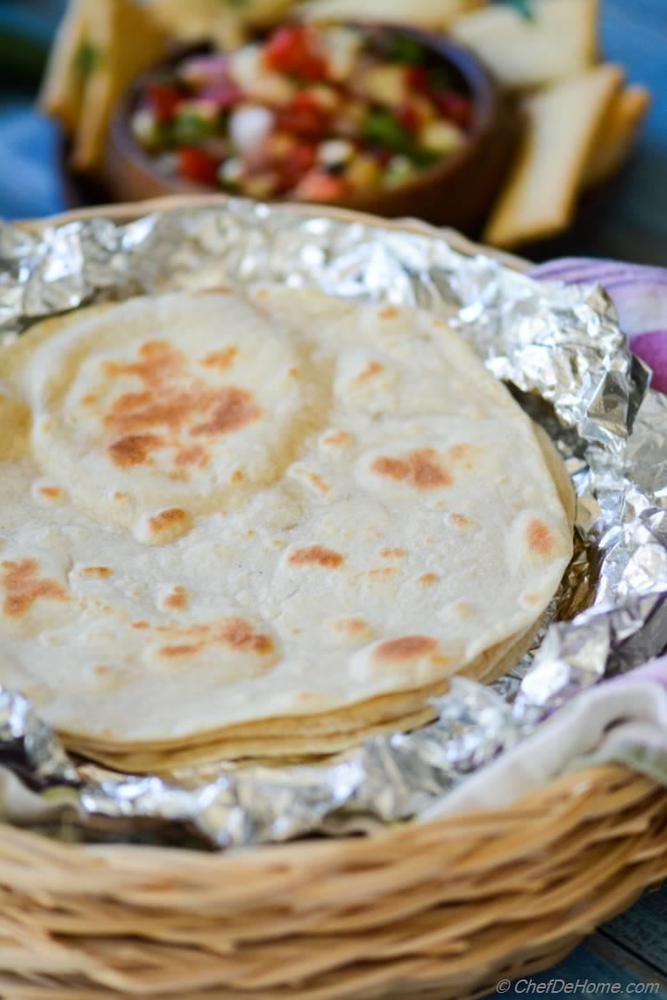 Homemade Flour Tortillas with 3 most-common pantry ingredients and step by step easy recipe to follow!