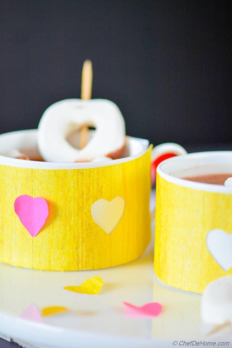 Valentine Day Hot Cocoa Served in Heart-Wrapped Cups with Heart Confetti