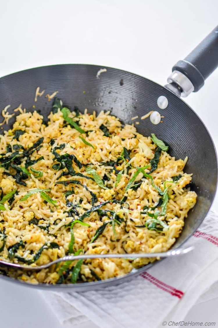 A Vegan bowl of Kale Fried Rice with egg-style scrambled tofu and hearty delicious kale | chefdehome.com