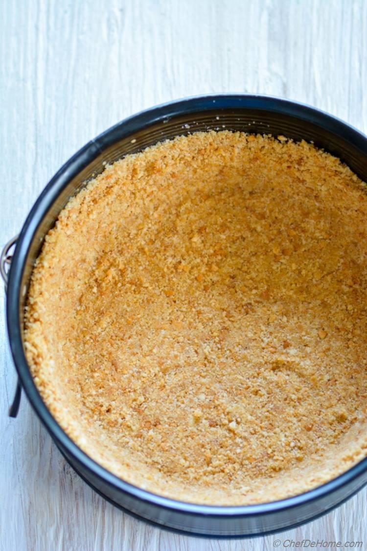 Graham Cracker Crust getting ready to mango cheesecake | chefdehome.com