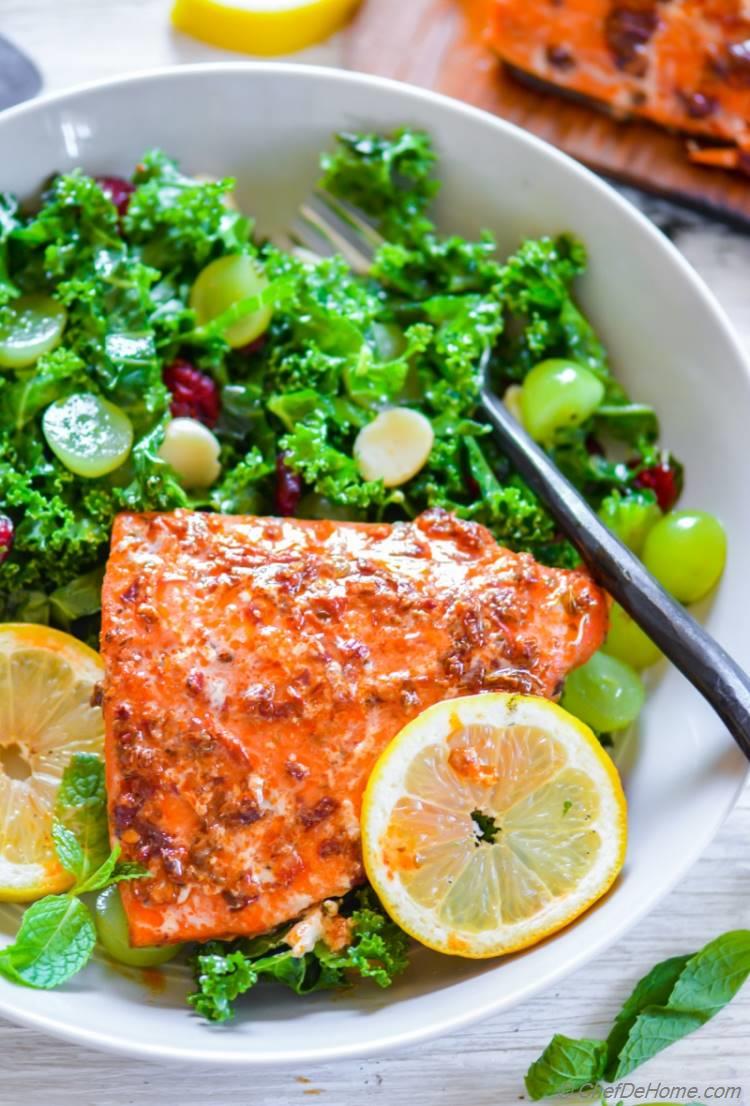 Healthy grilled Sweet and Spicy Chipotle Maple Glaze Salmon dinner with lite kale and grapes salad | chefdehome.com