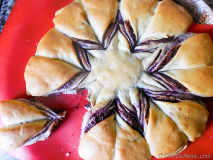 Breakfast Brioche Bread with layer of nutty nutella and sweet blueberry jam. One bake and breakfast is served!