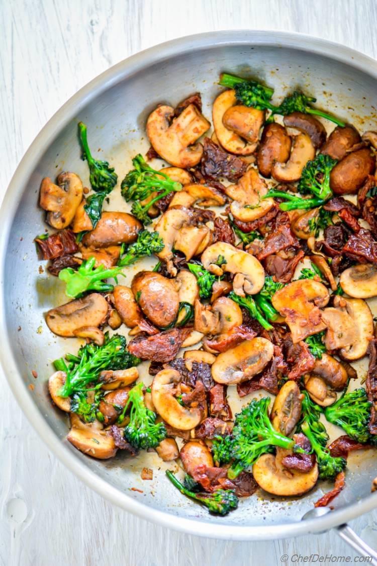 Mushroom and sundred tomatoes cooked with garlic and oil | chefdehome.com