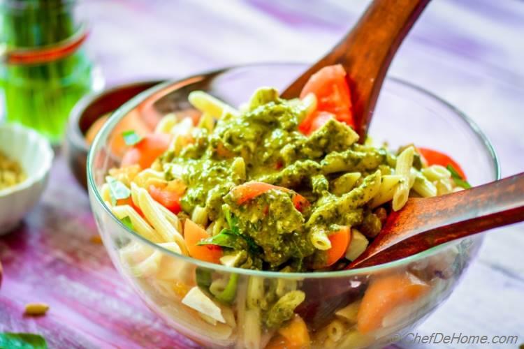 Tossing Caprese Salad in Pesto Dressing | chefdehome.com