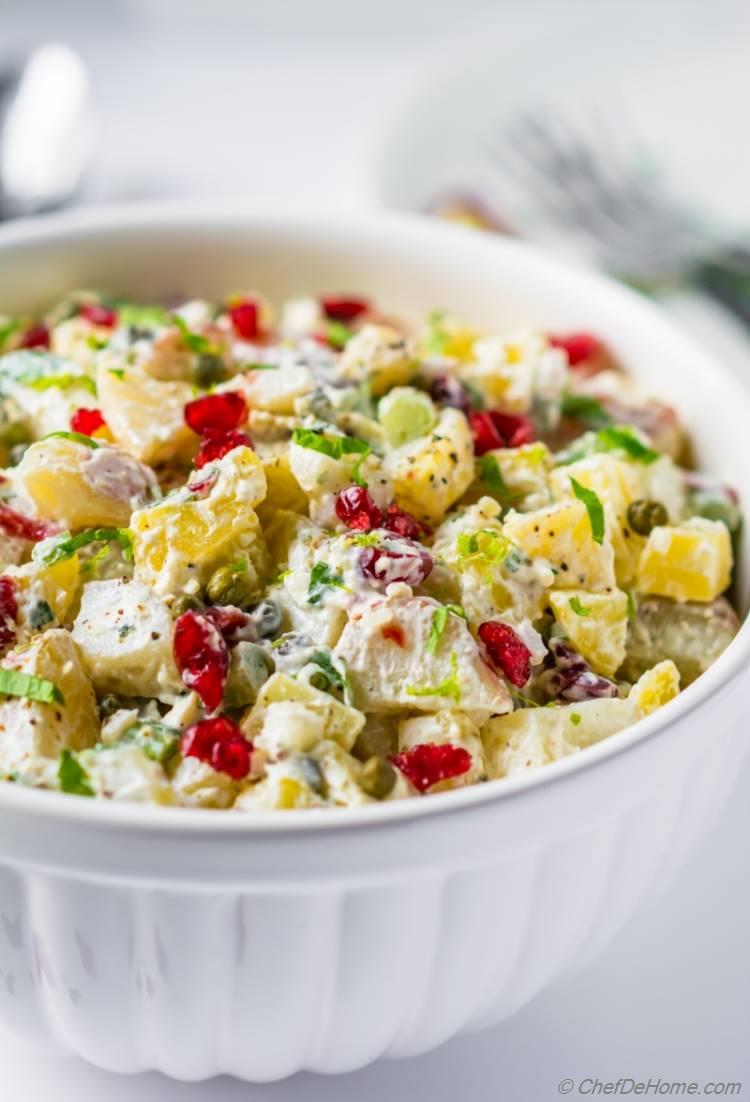 Potato salad with sweet cranberries, crunchy celery and no-mayo dressing | chefdehome.com