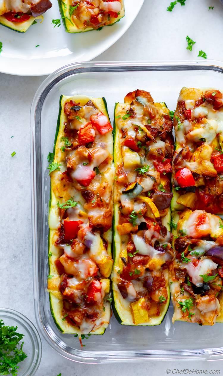 Out of oven cooked Zucchini Boats with Ratatouille Stuffing