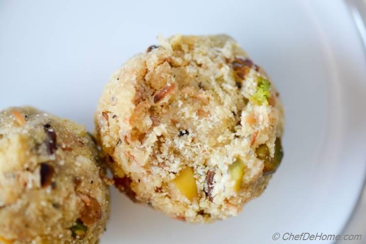 Rava (Semolina) Ladoo (truffles) have sweet, buttery bite with special surprise of crunchy pistachio nuts and savory plum golden raisins. Special favorite of kids, these sweets often disappear from your kitchen sooner than you can imagine!