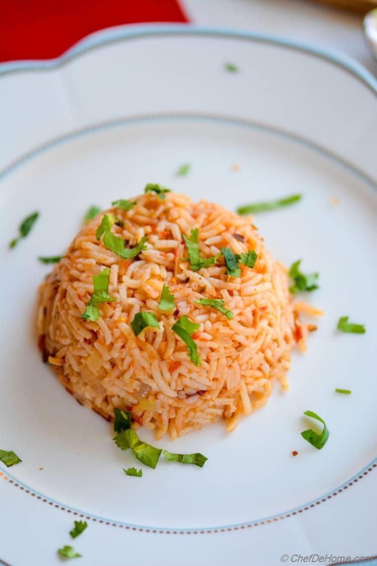 Spanish Tomato Rice cooked with fresh tomatoes and little heat of smokey chipotles!