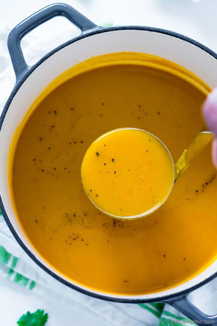 Vegan Butternut Squash Soup in Ladle 