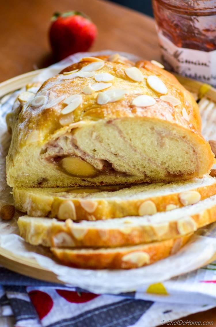 Scrumptious Breakfast Bread stuffed with strawberry preserve and almond candy