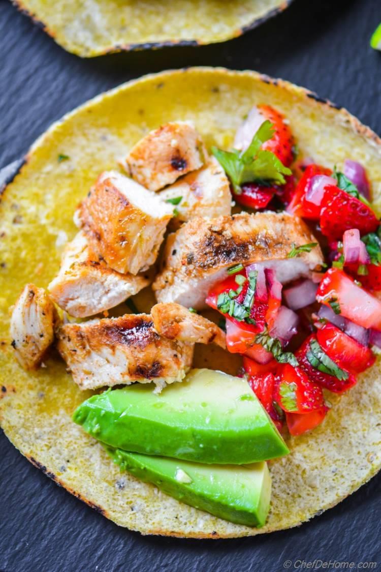 Close look at delicious Grilled Chicken Tacos with strawberry avocado salsa | chefdehome.com