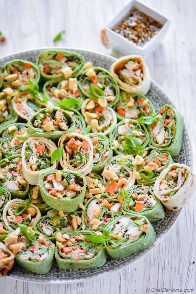 Party style Thai Peanut Chicken Wraps with spicy peanut sauce and crunchy veggies | chefdehome.com