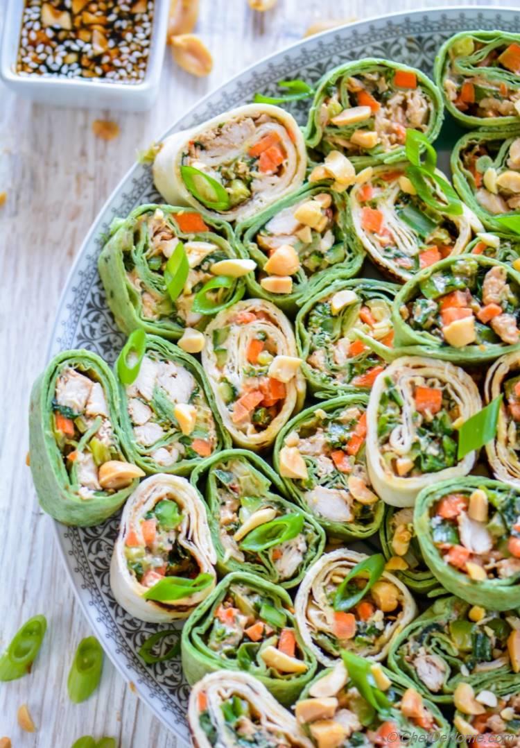 Party style Thai Peanut Chicken Wraps with spicy peanut sauce and crunchy veggies | chefdehome.com