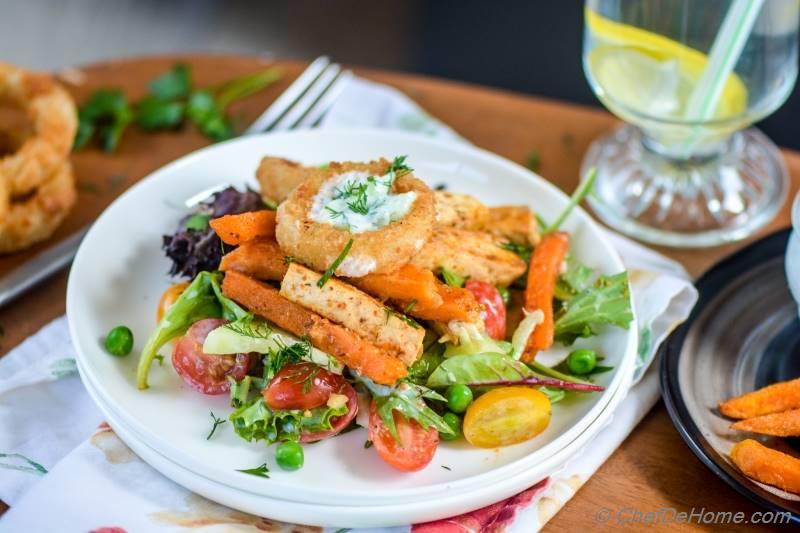 Tofu and Sweet Potato Fries Shawarma Salad Bowl with Onion Ring